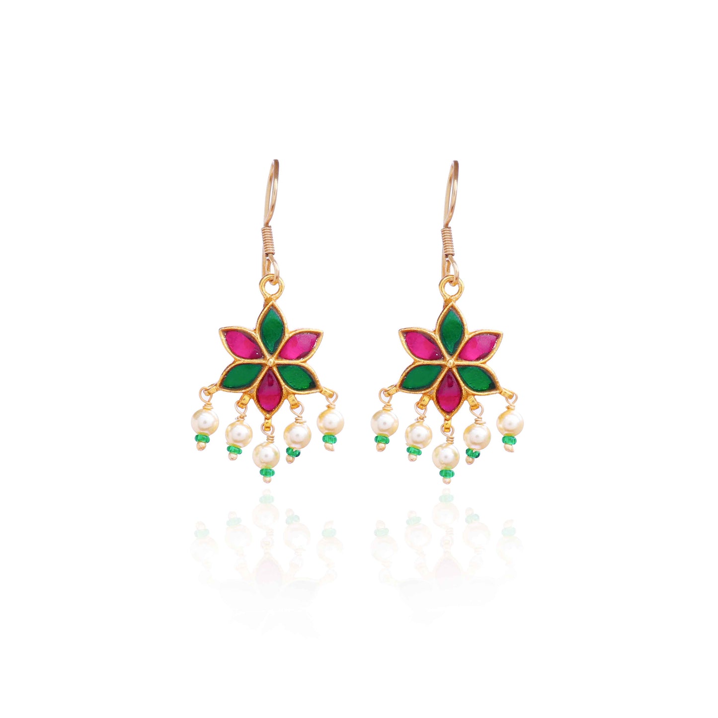A gold-plated floral drop earring with pink and green enamel petals, featuring dangling freshwater pearls and green bead accents, worn by a model.