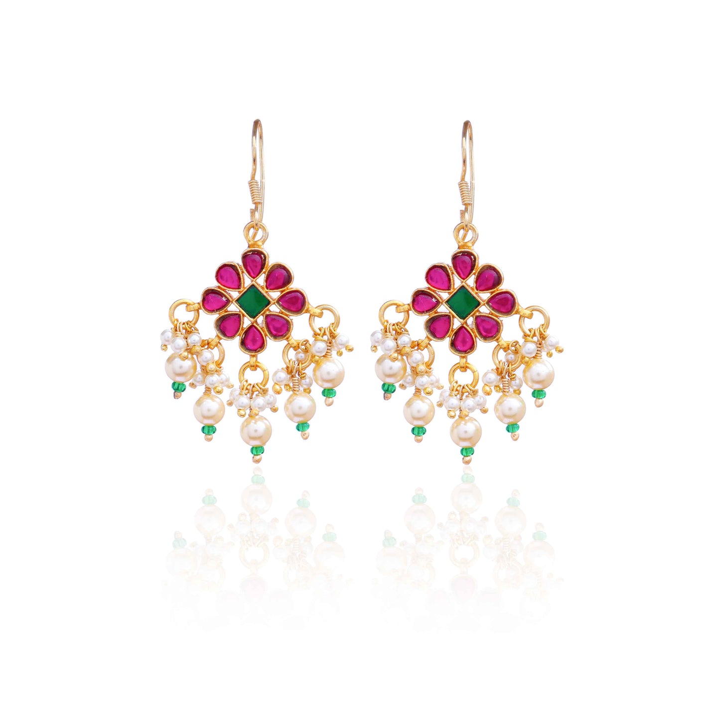 Gold-plated floral chandelier earrings with red and green gemstones, pearl drop accents, and intricate detailing, perfect for ethnic and festive wear.