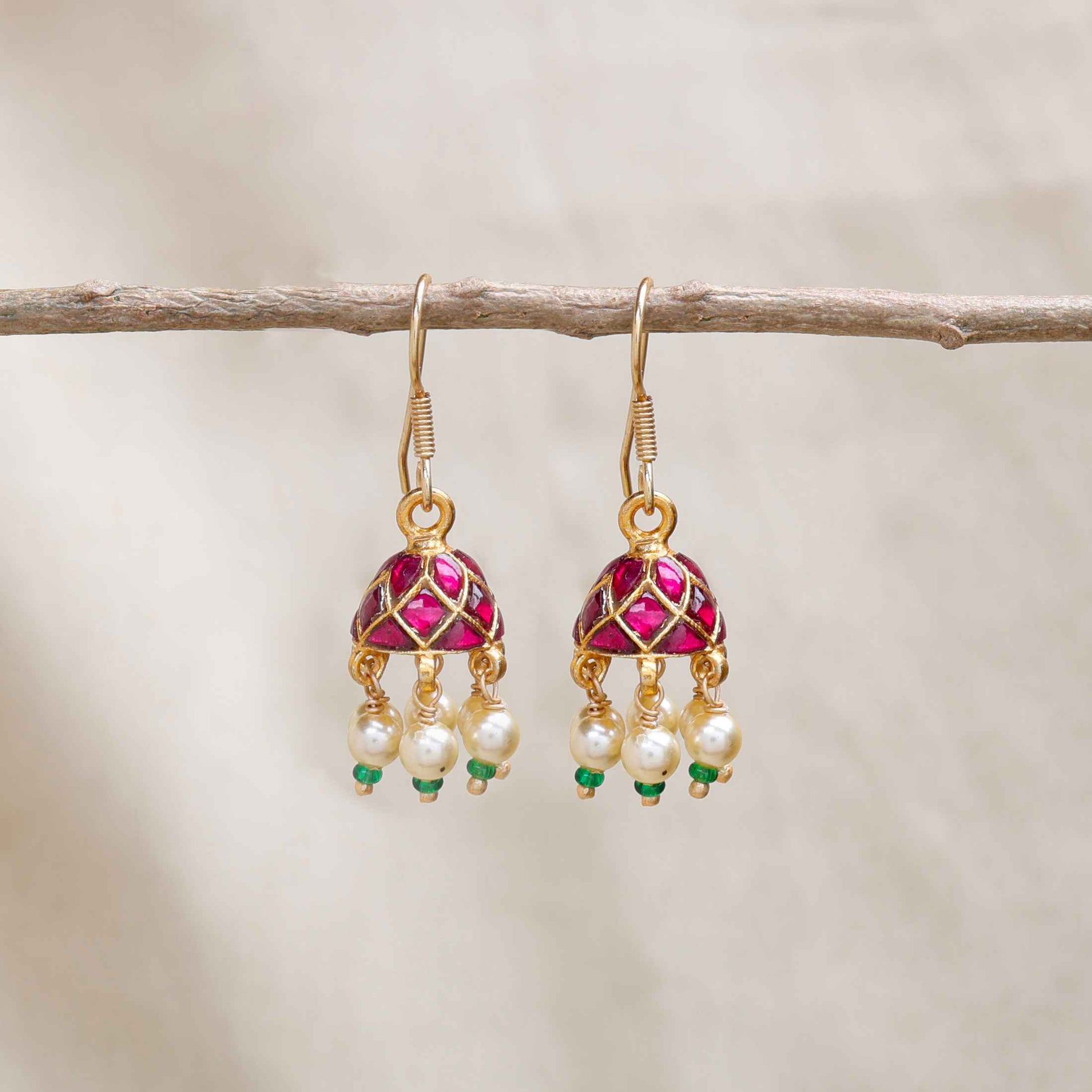 Silvernika kundan jhumki earrings 